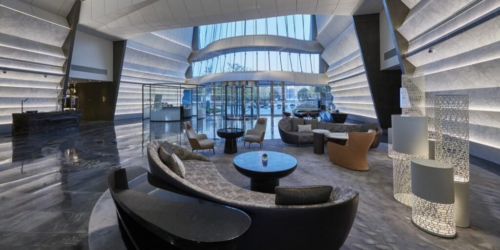 Traveler using Marriott AI-powered travel search tool to book a luxury hotel.